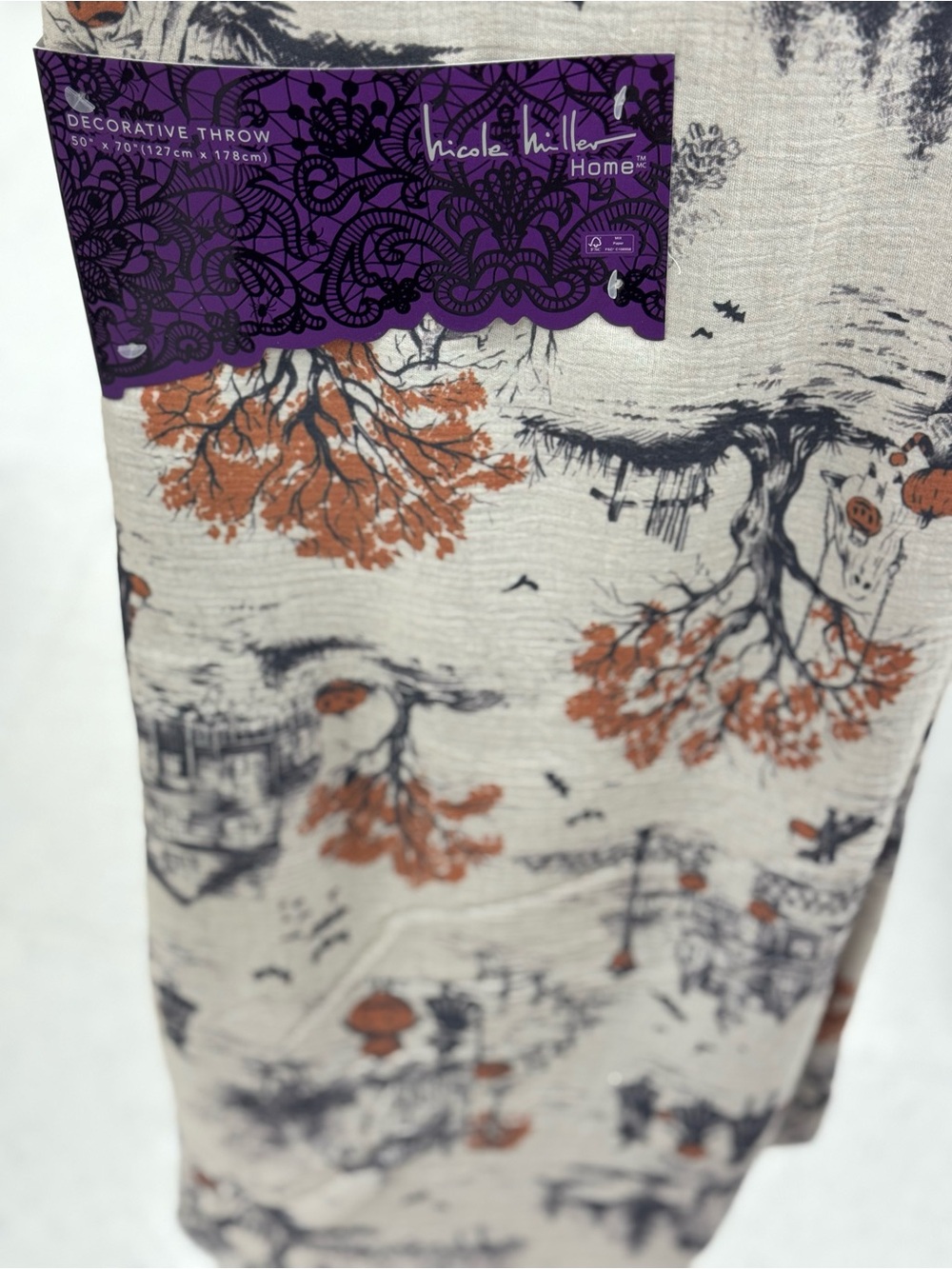 Nicole Miller Home Decorative Throw in Cream with Orange & Black Scenic Print